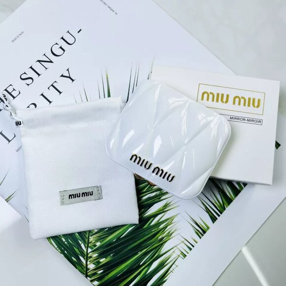 The Miu Miu compact mirror NIB - Picture 1 of 2